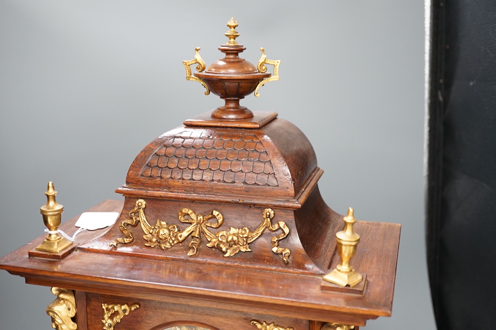 A reproduction gilt metal mounted bracket clock, 55cm